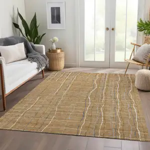 Photo of Gold Ivory And Gray Striped Washable Area Rug With UV Protection