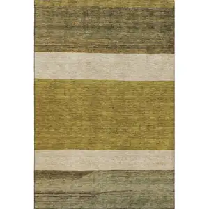 Photo of Gold Ivory And Gray Striped Washable Area Rug With UV Protection