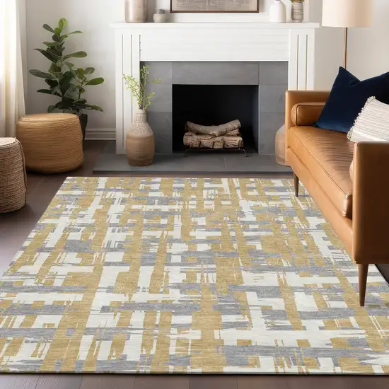 Gold Ivory And Gray Striped Washable Indoor Outdoor Area Rug Photo 6