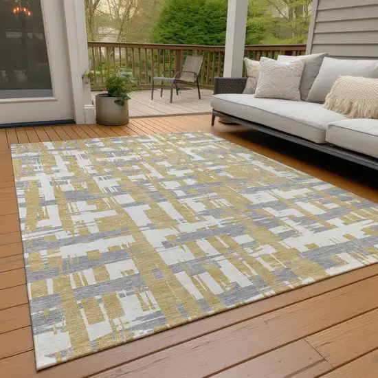 Gold Ivory And Gray Striped Washable Indoor Outdoor Area Rug Photo 8
