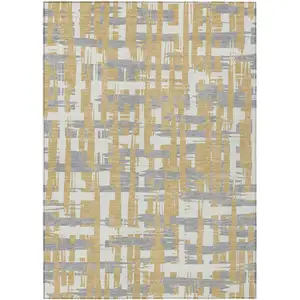 Photo of Gold Ivory And Gray Striped Washable Indoor Outdoor Area Rug