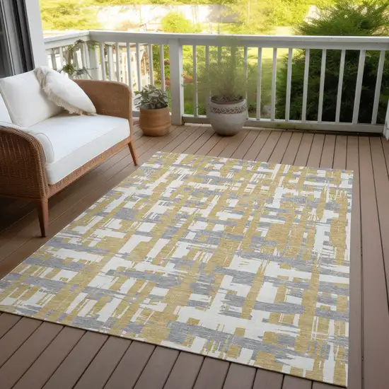 Gold Ivory And Gray Striped Washable Indoor Outdoor Area Rug Photo 5