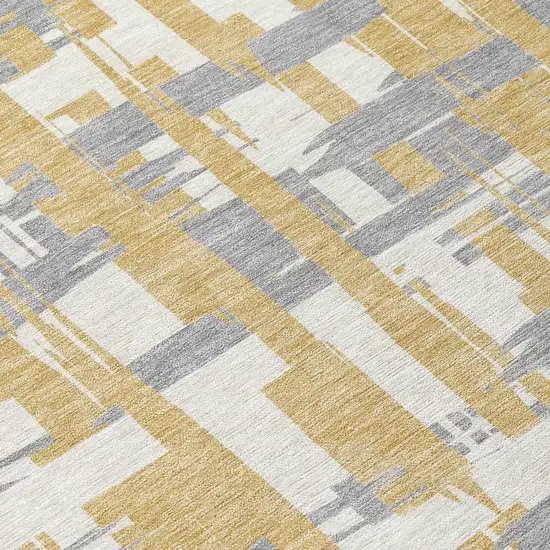 Gold Ivory And Gray Striped Washable Indoor Outdoor Area Rug Photo 9