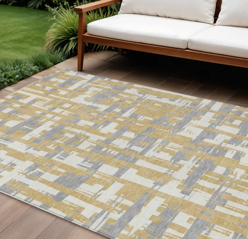 Gold Ivory And Gray Striped Washable Indoor Outdoor Area Rug Photo 2