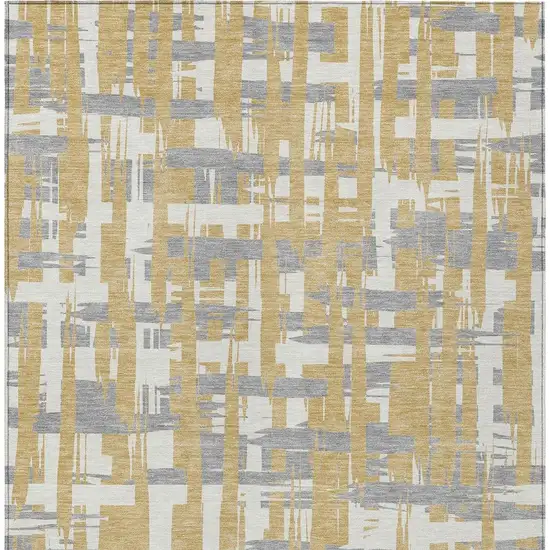 Gold Ivory And Gray Striped Washable Indoor Outdoor Area Rug Photo 4