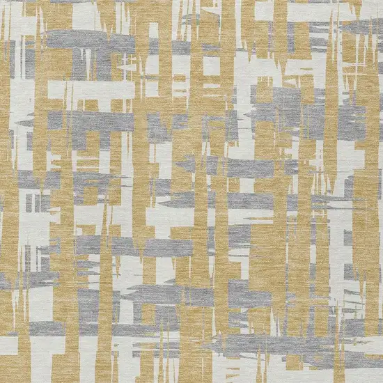 Gold Ivory And Gray Striped Washable Indoor Outdoor Area Rug Photo 3
