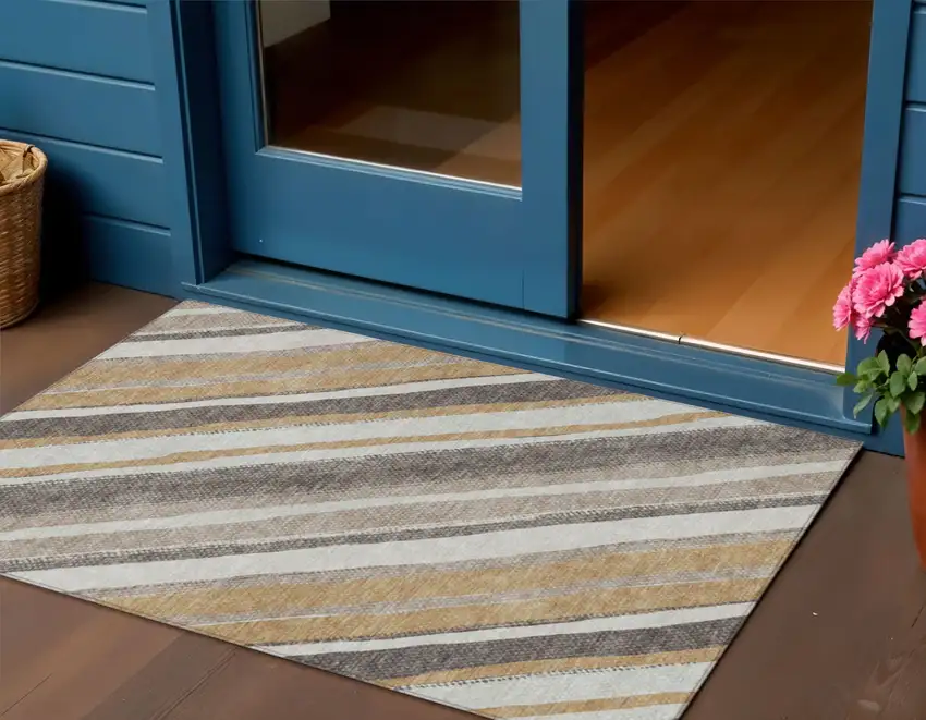 Gold Ivory And Taupe Striped Washable Indoor Outdoor Area Rug Photo 1