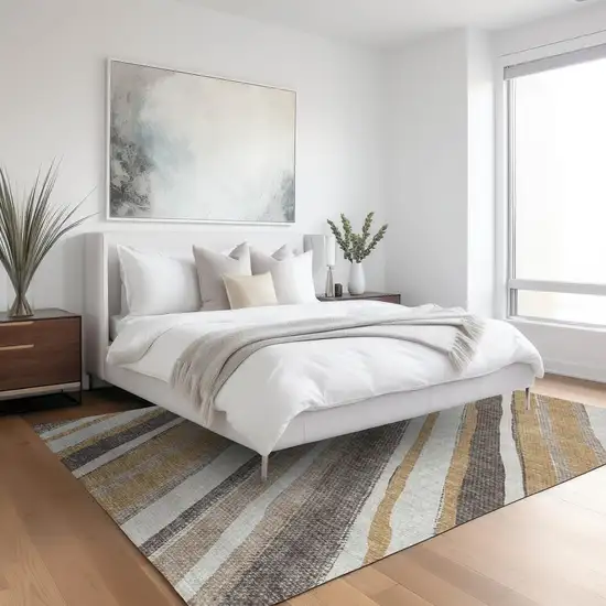 Gold Ivory And Taupe Striped Washable Indoor Outdoor Area Rug Photo 8