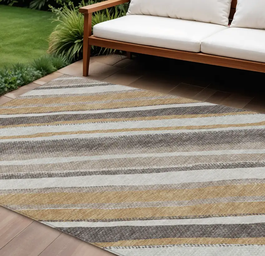 Gold Ivory And Taupe Striped Washable Indoor Outdoor Area Rug Photo 1