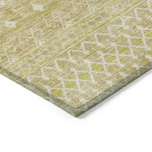 Photo of Gold Ivory And Taupe Tribal Washable Indoor Outdoor Area Rug