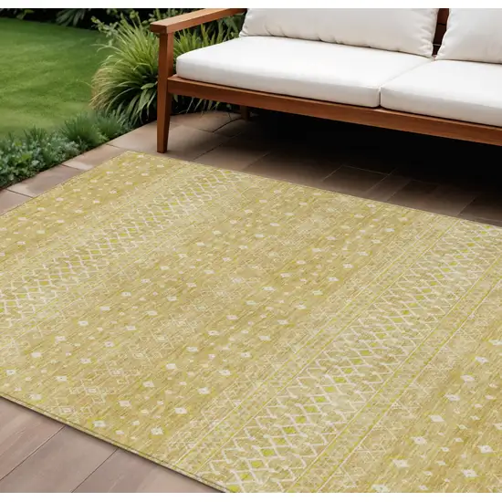 Gold Ivory And Taupe Tribal Washable Indoor Outdoor Area Rug Photo 1