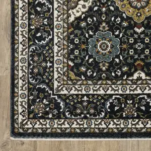Photo of Gold Medallion Area Rug With Fringe