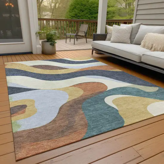 Gold Navy Blue And Ivory Abstract Washable Indoor Outdoor Area Rug Photo 9