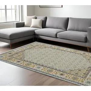 Photo of Gold Oriental Area Rug With Fringe