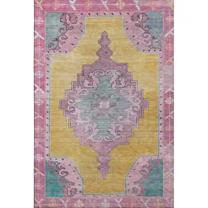 Photo of Gold Pink And Teal Oriental Washable Area Rug With UV Protection