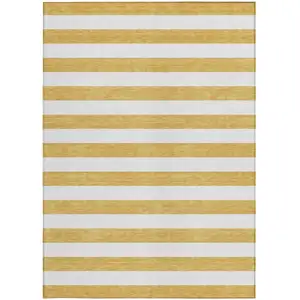 Photo of Gold Striped Washable Non Skid Indoor Outdoor Area Rug
