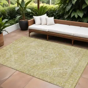 Photo of Gold Tan And Beige Oriental Washable Indoor Outdoor Area Rug