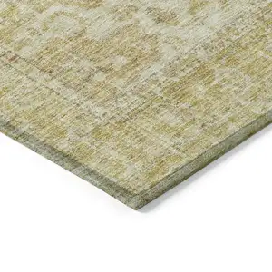 Photo of Gold Tan And Beige Oriental Washable Indoor Outdoor Area Rug
