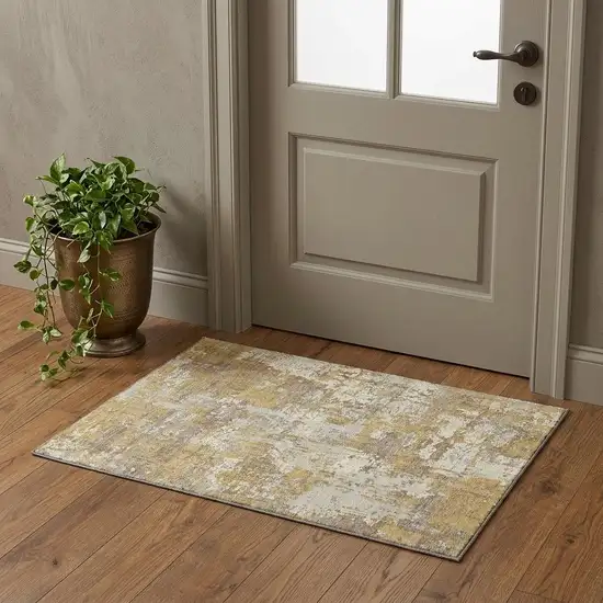 Gold Taupe And Beige Abstract Washable Area Rug With UV Protection Photo 1