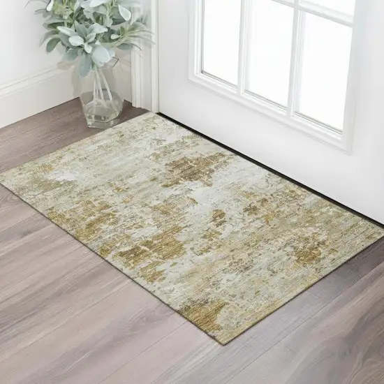 Gold Taupe And Beige Abstract Washable Area Rug With UV Protection Photo 2
