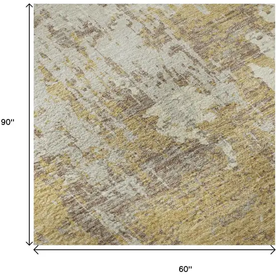 Gold Taupe And Beige Abstract Washable Area Rug With UV Protection Photo 9