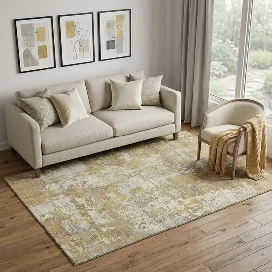 Gold Taupe And Beige Abstract Washable Area Rug With UV Protection Photo 1