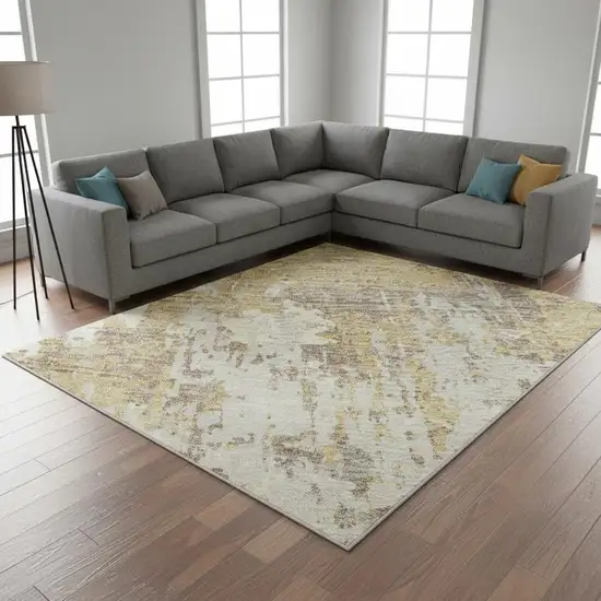 Gold Taupe And Beige Abstract Washable Area Rug With UV Protection Photo 2