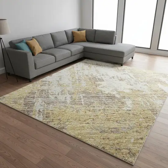 Gold Taupe And Beige Abstract Washable Area Rug With UV Protection Photo 2