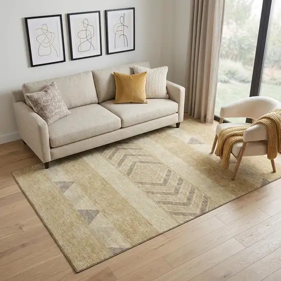 Gold Taupe And Beige Southwestern Washable Area Rug With UV Protection Photo 1