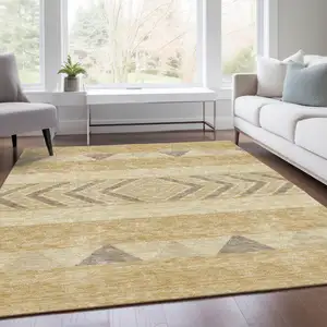Photo of Gold Taupe And Beige Southwestern Washable Area Rug With UV Protection