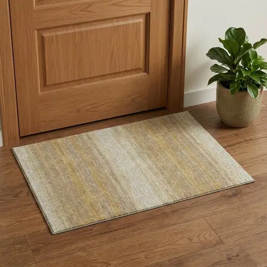 Gold Taupe And Ivory Striped Washable Area Rug With UV Protection Photo 1