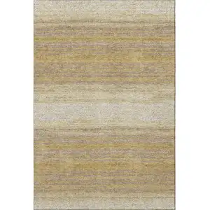 Photo of Gold Taupe And Ivory Striped Washable Area Rug With UV Protection