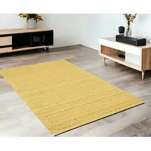 Photo of Gold Wool Area Rug