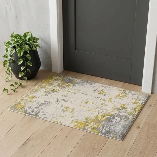 Gold And Gray Abstract Distressed Area Rug Photo 1