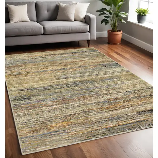 Gold And Green Abstract Area Rug Photo 1