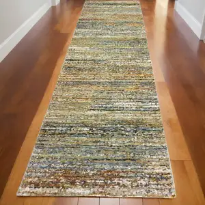 Photo of Gold and Green Abstract Runner Rug