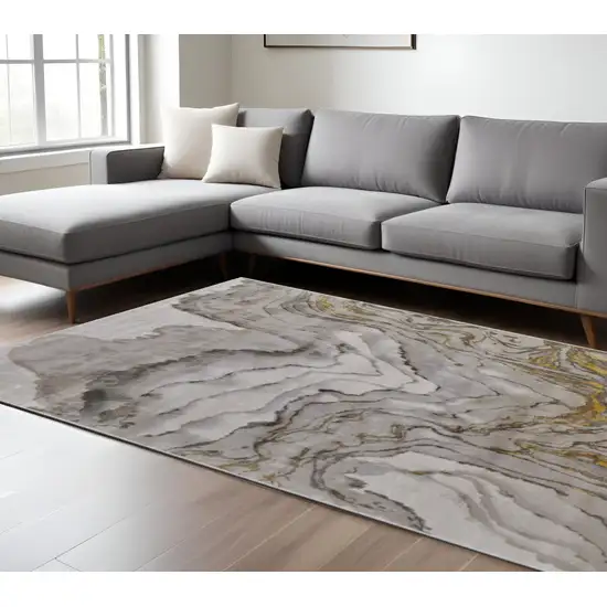 Gold Ivory And Gray Abstract Area Rug Photo 1