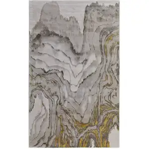 Photo of Gold and Ivory Abstract Area Rug