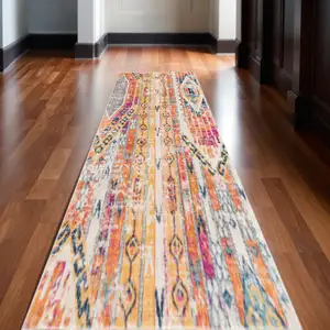 Photo of Gold and Ivory Distressed Tribal Runner Rug