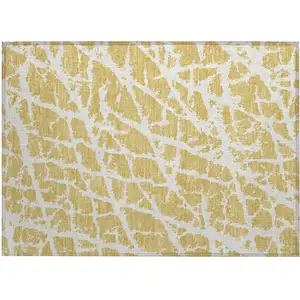 Photo of Gold and White Abstract Washable Non Skid Indoor Outdoor Area Rug
