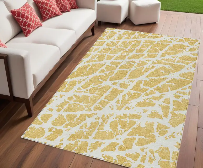 Gold and White Abstract Washable Non Skid Indoor Outdoor Area Rug Photo 1