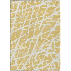 Photo of Gold and White Abstract Washable Non Skid Indoor Outdoor Area Rug