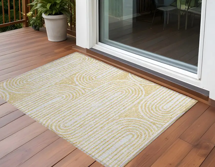 Gold and White Abstract Washable Non Skid Indoor Outdoor Area Rug Photo 1