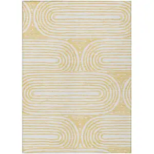Photo of Gold and White Abstract Washable Non Skid Indoor Outdoor Area Rug