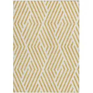 Photo of Gold and White Geometric Washable Non Skid Indoor Outdoor Area Rug
