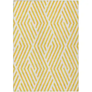 Photo of Gold and White Geometric Washable Non Skid Indoor Outdoor Area Rug