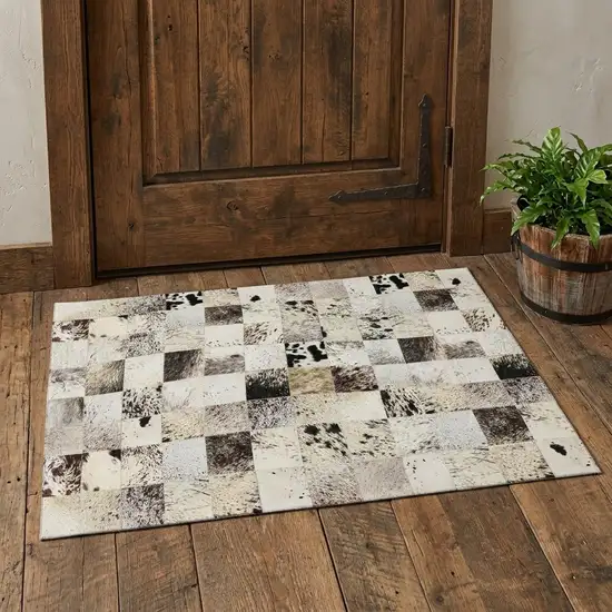 Black Granite Gray And Ivory Cowhide Print Washable Area Rug With UV Protection Photo 1