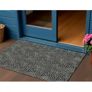 Photo of Graphite And Black Leopard Print Washable Indoor Outdoor Area Rug