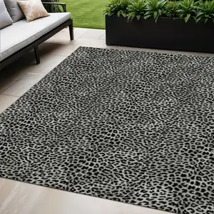 Photo of Graphite And Black Leopard Print Washable Indoor Outdoor Area Rug