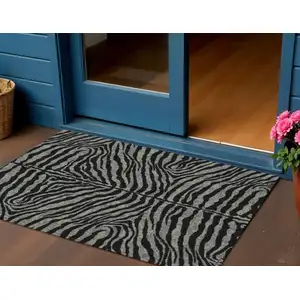 Photo of Graphite And Black Zebra Print Washable Indoor Outdoor Area Rug